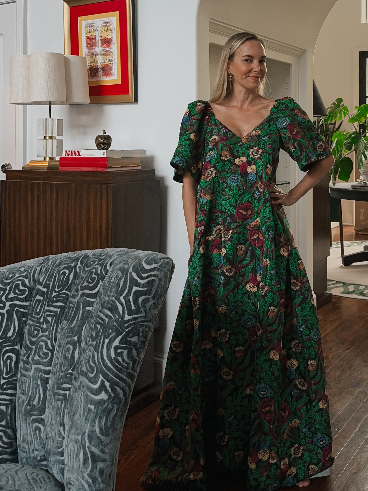 Lindsay wearing a La Double J green and floral gown